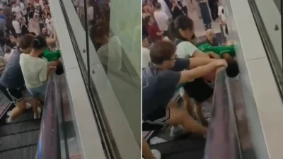 Child Stuck in Escalator